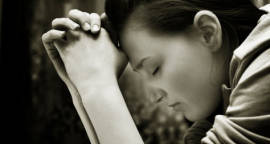 image of young woman praying